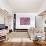 Elm Living South with Royal Oak Floors creating a warm ambiance