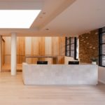Close-up of wooden floor texture with a warm, natural tone