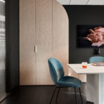 Modern design with intricate wood flooring patterns.