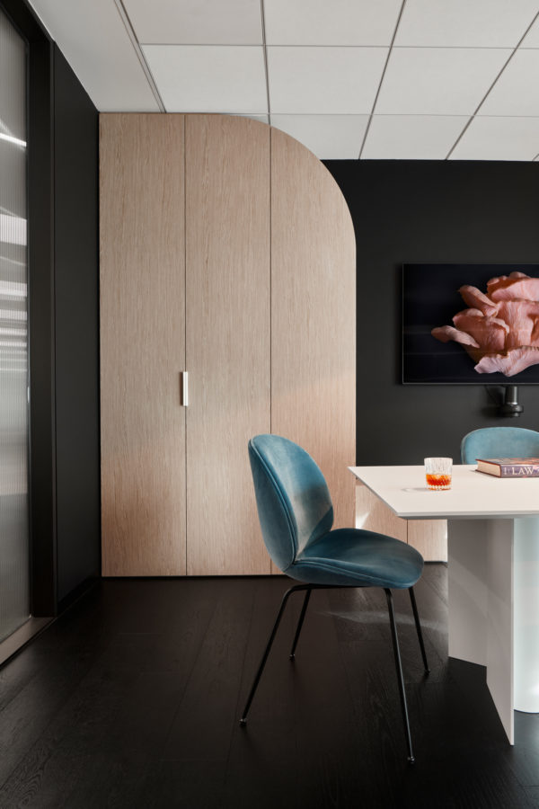 Modern design with intricate wood flooring patterns.